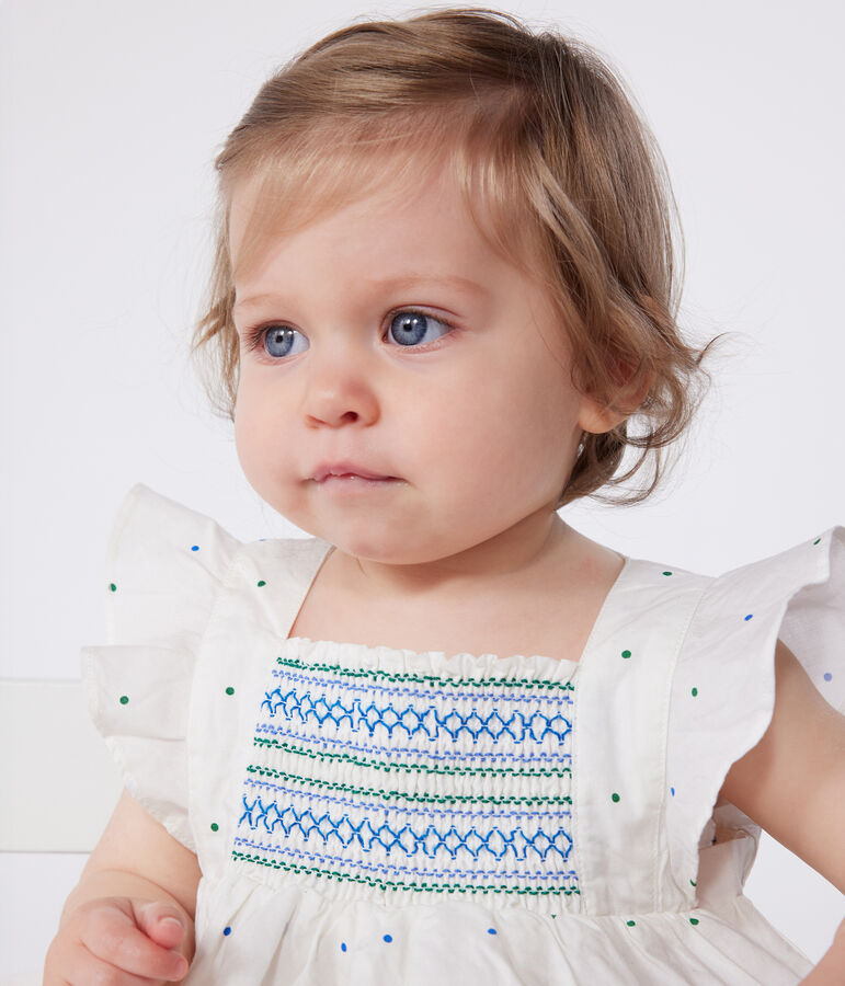 Witte katoenen babyjurk met bloomer in stippenprint wit/multicouleur