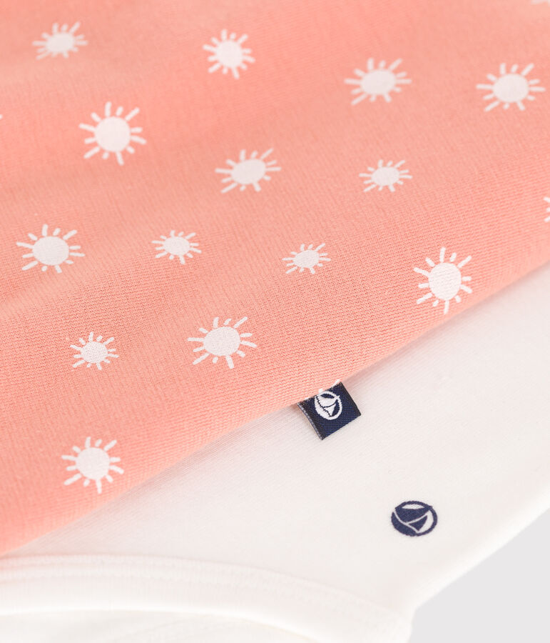 Ensemble naissance salopette en coton imprim&eacute; soleils et body orange/blanc