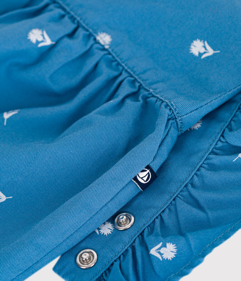 Katoenen babysalopette met lange pijpen en geborduurde bloemetjes blauw/wit