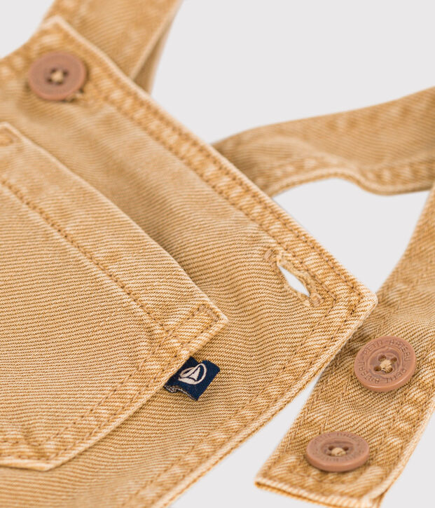 Salopette courte en denim de couleur b&eacute;b&eacute; beige