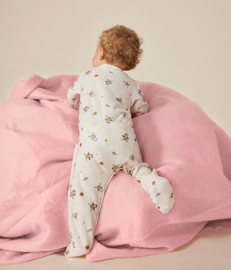 Babypyjama van velours met een print van een kleine pingu&iuml;n in de ruimte wit/multicouleur