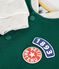 Tweekleurige katoenen babybeer groen/beige