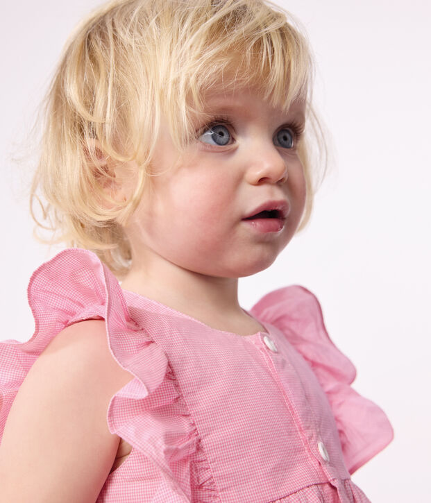 Mouwloos babyjurkje in licht katoen met bloomer en vichyprint wit/roze