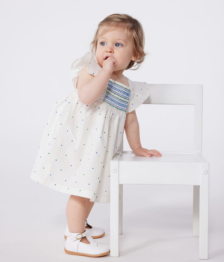 Witte katoenen babyjurk met bloomer in stippenprint wit/multicouleur