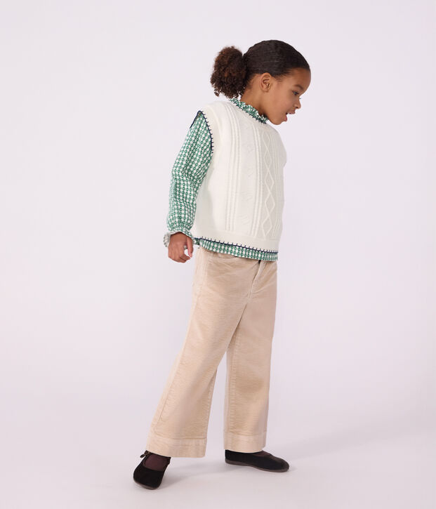 Mouwloze kindertrui van wol en katoen met kabeltricot wit