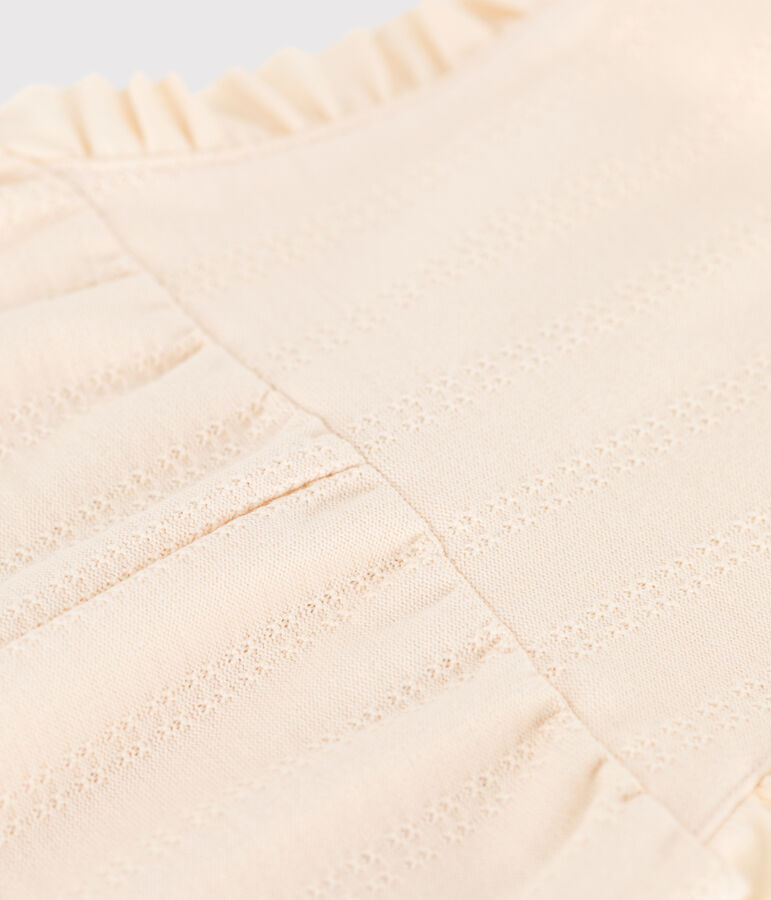 Pakje met lange mouwen in jerseystof met fantasiestippen voor baby's ecru