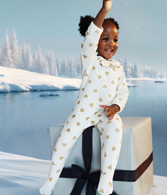 Babypyjama van fluweel met opening aan de achterkant en bedrukt met paillettenhartjes MILK/ DORE