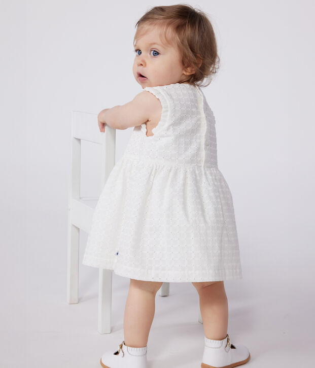 Wit mouwloos katoenen babyjurkje met broderie anglaise wit