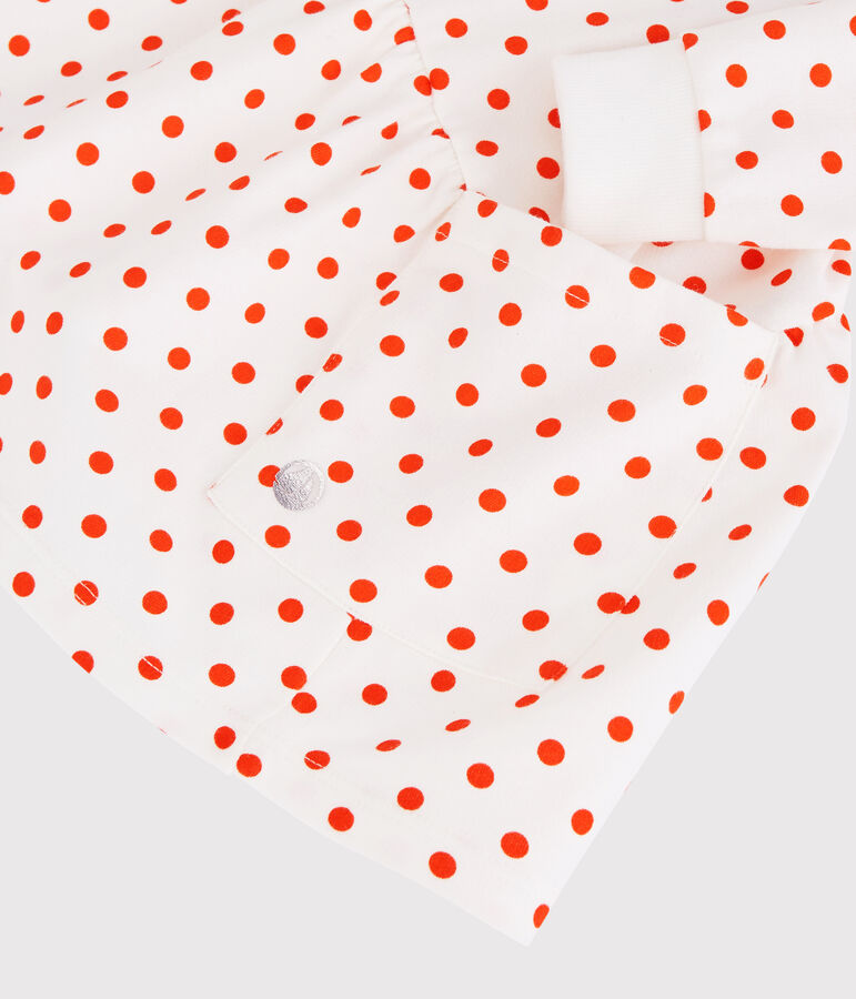 Babyjurk van molton. wit/oranje