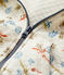 Gewatteerd babyvest. beige MONTELIMAR/wit MULTICO
