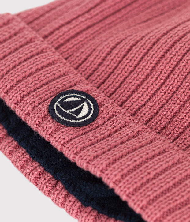 Met fleece gevoerde gebreide babymuts roze