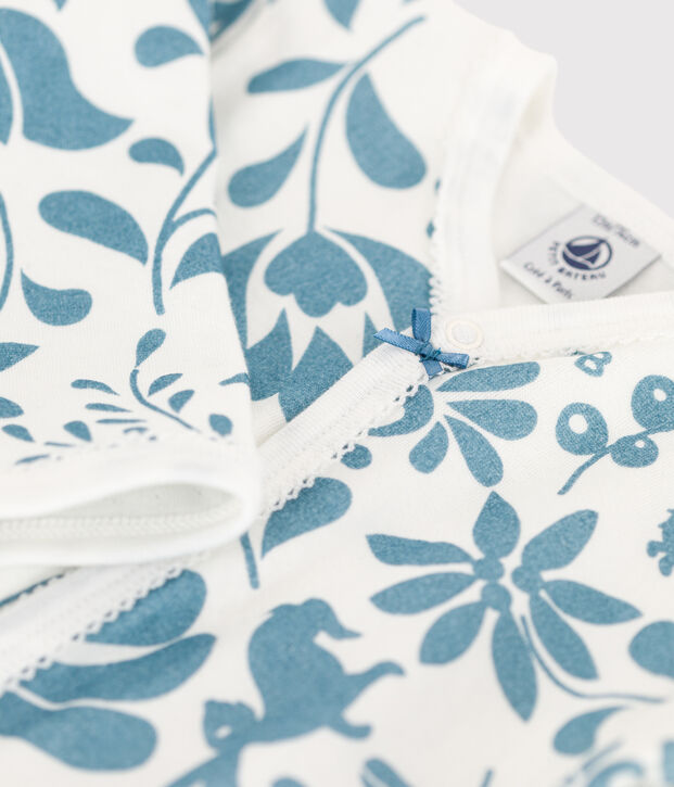 Babypyjama met bloemetje in tubic wit/blauw