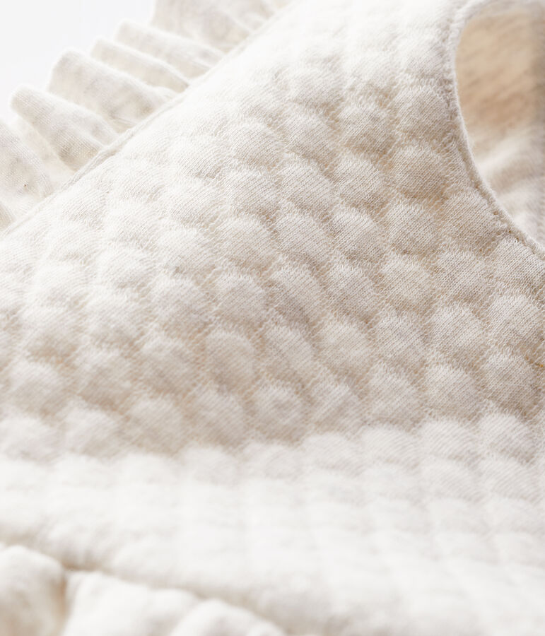 Lange salopette babymeisje beige