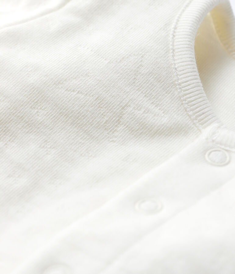 Witte babycardigan met sterren van doorgestikt tubic biologisch katoen wit