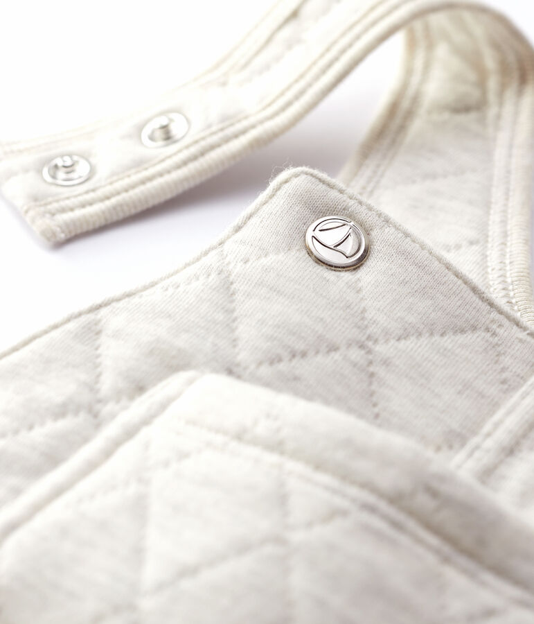 Gewatteerde salopette baby. beige