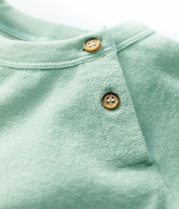 Kort pakje in boucl&eacute;badstof voor baby's groen